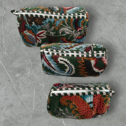 The Teal Thread set of 3 quilted cotton velvet vanity bags in wildflower green with floral prints and zipper closures.